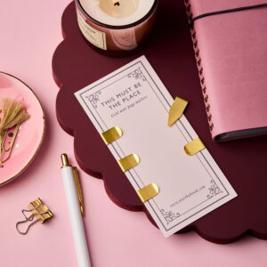 martha brook personalised stationery gold mini page markers on a burgundy scalloped stand
